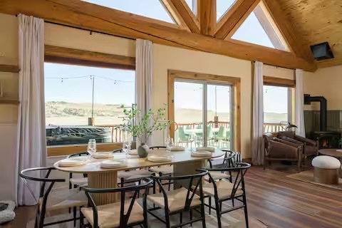 Dining area with vaulted ceilings and rustic elegance